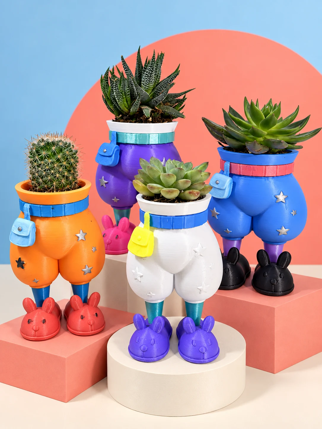 Orange, blue, purple and white pants planters with miniature bags and colorful bunny slippers